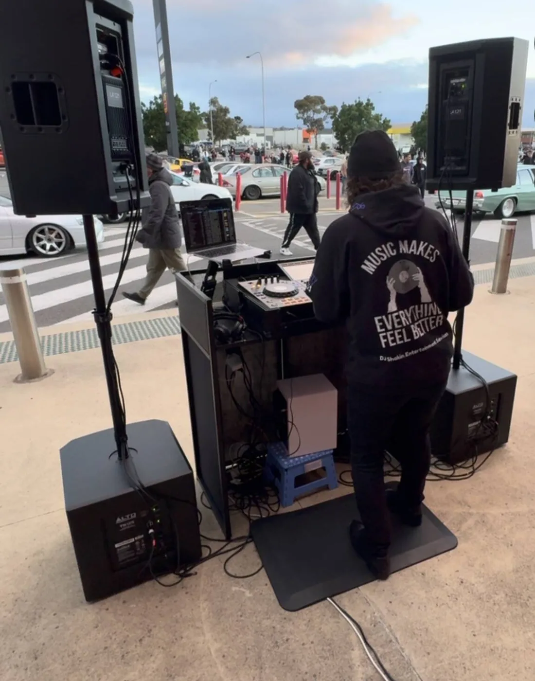 DJ Shakin playing at an Adelaide car meet at dusk
