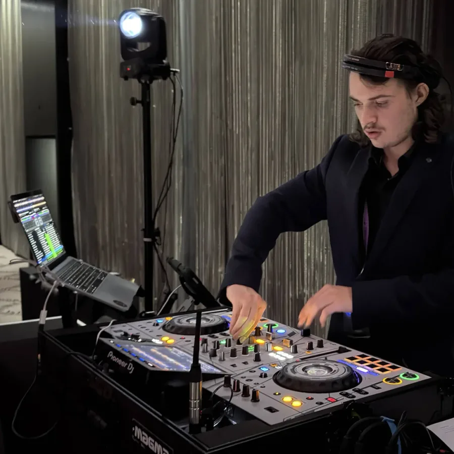 Party DJ Shakin playing to a packed Adelaide dance floor with effect lighting